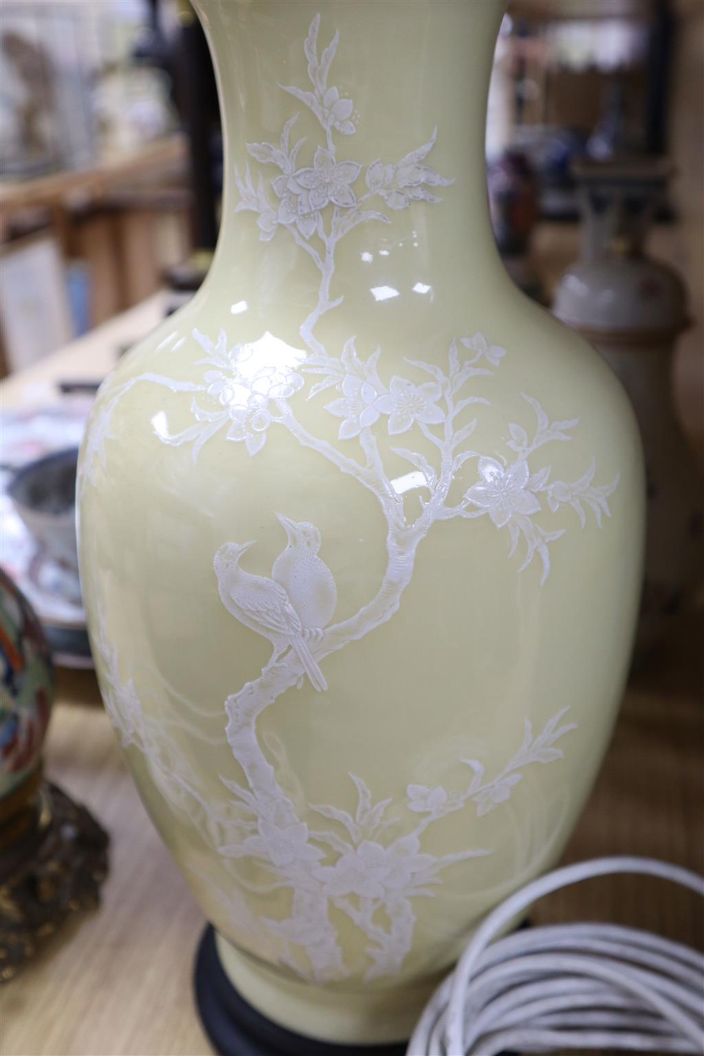 A Chinese cream glazed and white enamelled baluster vase, 36cm and a Canton enamelled vase, both converted to lamps, latter repairs